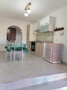 Η κουζίνα ή μικρή κουζίνα στο A casa di Ro`