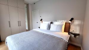 Кровать или кровати в номере Park Premium Apartments