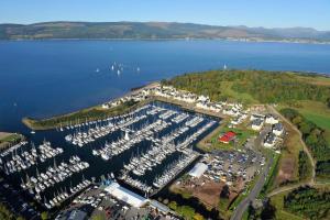 an aerial view of a marina with lots of boats at Cameron Cottage in Inverkip