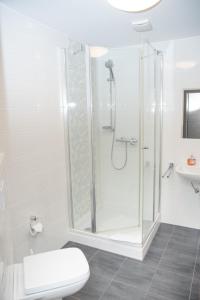Koupelna v ubytování Hotel Fulda + 16 fotografií