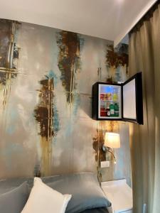 TV a/nebo společenská místnost v ubytování Villa D Erna Marina di Pietrasanta