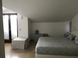 A bed or beds in a room at Maria Ancona suite