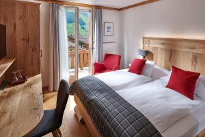 Tempat tidur dalam kamar di Hotel Bristol Relais du Silence Superior