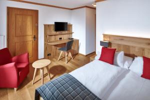 TV a/nebo společenská místnost v ubytování Hotel Bristol Relais du Silence Superior