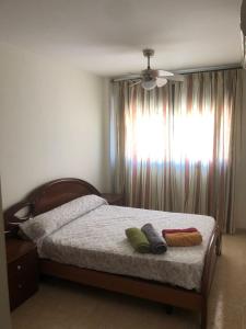 Postel nebo postele na pokoji v ubytování APARTAMENTO JUNTO A LA PLAYA