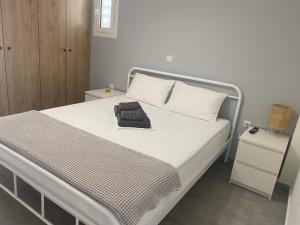 Postel nebo postele na pokoji v ubytování DiFan Sea Homes A2