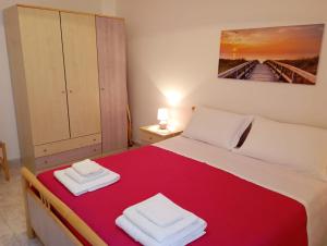 En eller flere senge i et værelse på Meridiana 3