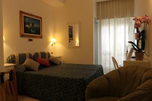 Posezení v ubytování Capri Bougainville Luxury Boutique Hotel
