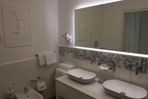 Koupelna v ubytování Capri Bougainville Luxury Boutique Hotel