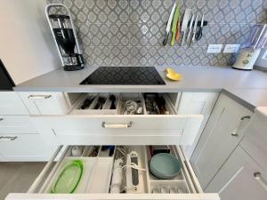 A kitchen or kitchenette at casa prima gardenia