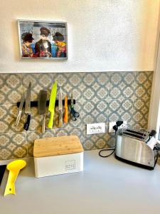A kitchen or kitchenette at casa prima gardenia