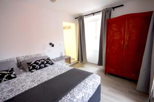 Postel nebo postele na pokoji v ubytování Phiros B&B
