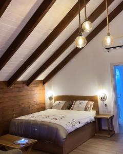 Postel nebo postele na pokoji v ubytování ארואד סוויטס Arwad suites