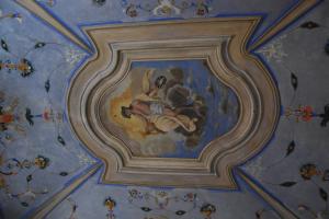 a painting on the ceiling of a room at Residenza storica Volta della Morte in Urbino