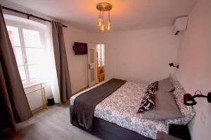Postel nebo postele na pokoji v ubytování Phiros B&B