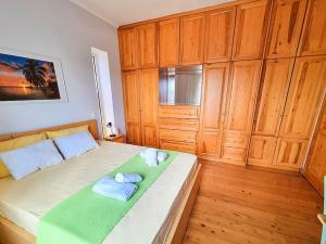 Postel nebo postele na pokoji v ubytování Artemis House
