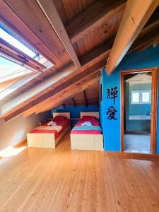 Postel nebo postele na pokoji v ubytování Artemis House