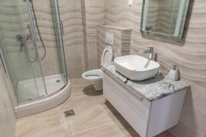 Kúpeľňa v ubytovaní Apartmani Dalmacija Drage