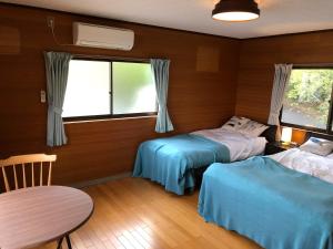 Tempat tidur dalam kamar di Villa Chillon - Vacation STAY 97710