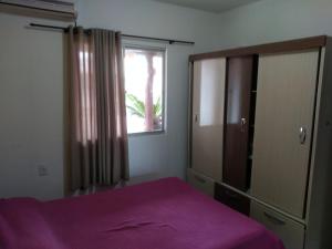 Katil atau katil-katil dalam bilik di Casa de praia navegantes, próximo aeroporto