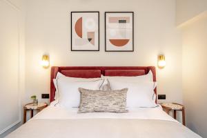 Rúm í herbergi á Albi Boutique Hotel - Traveler's Choice 2024