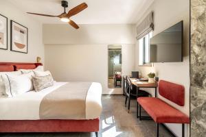 Rúm í herbergi á Albi Boutique Hotel - Traveler's Choice 2024