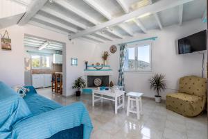 Posezení v ubytování Pastalia Cottage