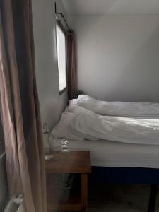 Uma cama ou camas num quarto em Gil guesthouse