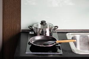 Cucina o angolo cottura di Pecan by Kozystay - Sudirman