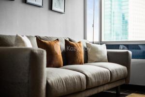 Area soggiorno di Pecan by Kozystay - Sudirman
