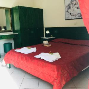Posteľ alebo postele v izbe v ubytovaní L'eremo Luxury Studio