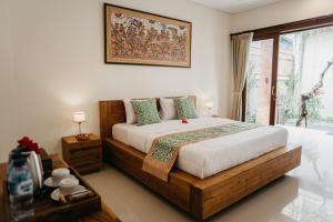 Giường trong phòng chung tại Tu Sandat Homestay