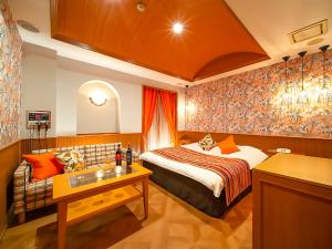 Postel nebo postele na pokoji v ubytování Hotel Rocco (Adult Only)