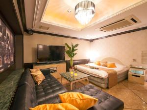 TV a/nebo společenská místnost v ubytování Hotel Rocco (Adult Only)