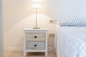 A bed or beds in a room at Villa Lumb