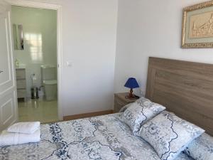 Posteľ alebo postele v izbe v ubytovaní APARTAMENTOS SOL ANDALUZ - GOYA