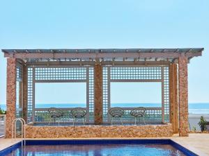 Bazén v ubytování HOTEL SEABREEZE CORAL nebo v jeho okolí