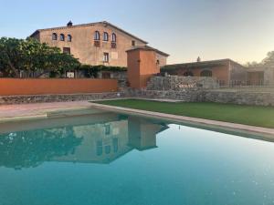Bazén v ubytování Mas Teixidor, Masia entre Girona y la Costa Brava nebo v jeho okolí