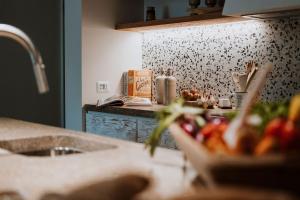 Kuchyňa alebo kuchynka v ubytovaní Borgo 69 Villas & Suites