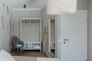 Postel nebo postele na pokoji v ubytování Haus Mörbisch