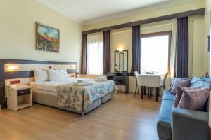 Кровать или кровати в номере Hotel Karacam