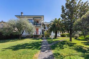 Gallery image of Residence Mimosa PT2 by Wonderful Italy in Toscolano Maderno