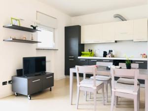 A kitchen or kitchenette at Stepandgo Milano Navigli