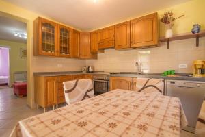 Kuchyňa alebo kuchynka v ubytovaní Jasna B4 apartman + 10 fotografií