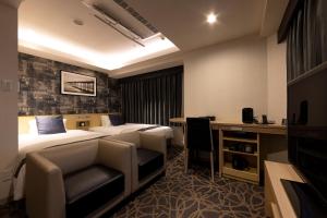 Una cama o camas en una habitación de Hotel Actel Nagoya Nishiki