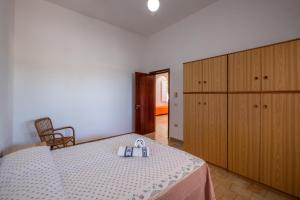 Posteľ alebo postele v izbe v ubytovaní Villa Edy