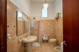 Kúpeľňa v ubytovaní Villa Edy