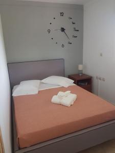 Ένα ή περισσότερα κρεβάτια σε δωμάτιο στο Amalthia