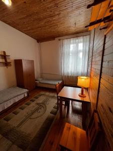 Posteľ alebo postele v izbe v ubytovaní Cicha Dolina