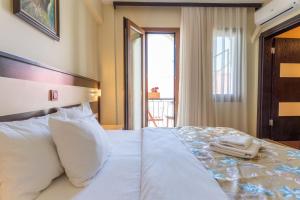 Кровать или кровати в номере Hotel Karacam